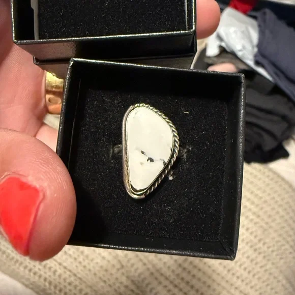 Sophisticated Silver Solitaire Ring with White Stone